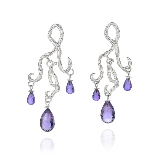 Artisan 925 sterling silver organic vine earrings by Rawan Kanan featuring faceted amethyst drops.