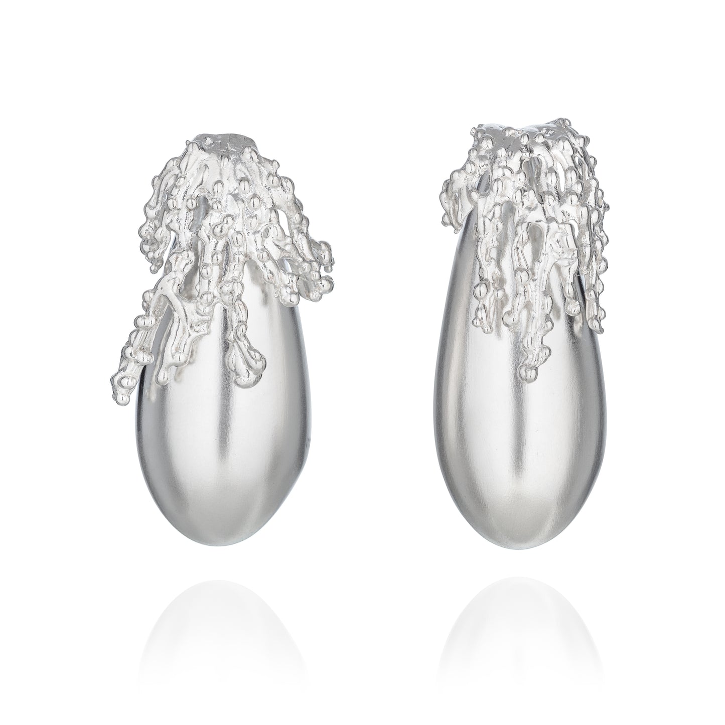Artisan 925 sterling silver sculptural drop earrings by Rawan Kanan, matte finish with granulated detail.