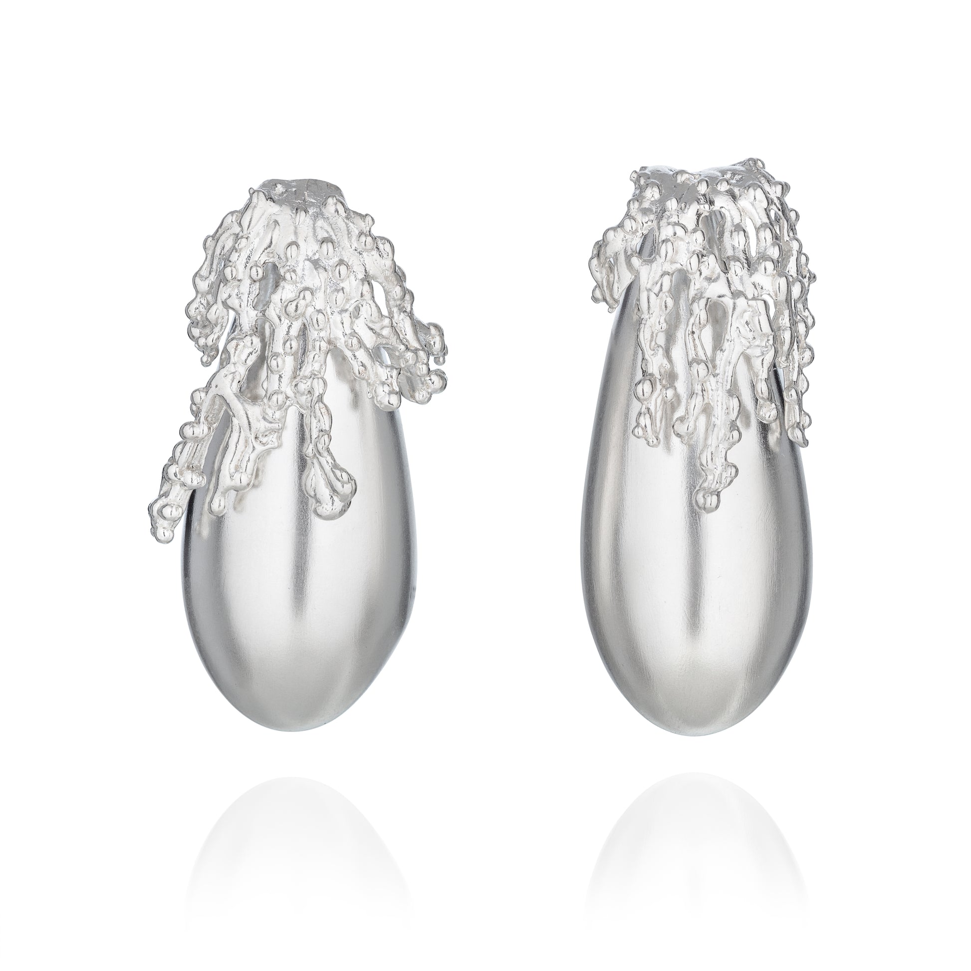 Artisan 925 sterling silver sculptural drop earrings by Rawan Kanan, matte finish with granulated detail.
